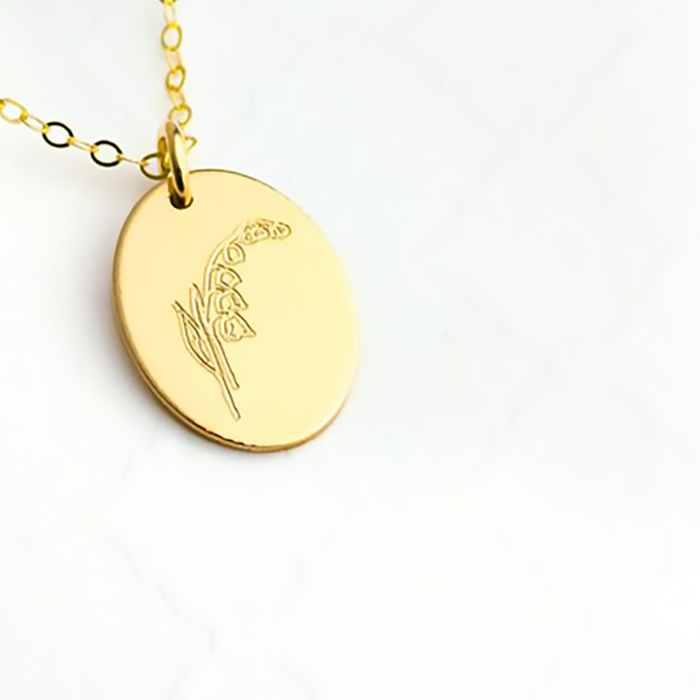 Birth flower, birth month flower oval disc addition chain not included. choose one or both sides engraved.