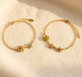 personalized birthstone bracelet for mom with each gemstone representing her children in a delicate Bloom-inspired flower setting crafted in sterling silver gold filled and rose gold filled customizable family birthstone bracelet meaningful mom gift for Mother’s Day birthday or Christmas adjustable chain minimalist feminine jewelry handmade high quality materials sentimental keepsake honoring motherhood and the special bond between mom and kids