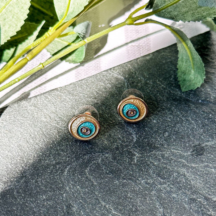 Abstract spiral earrings and necklace set, spiral statement earrings, jewelry set for summer, summer vacation fashion, statement geometric pendant on collar necklace, jewelry to wear to anniversary dinner, date night jewelry, artsy standout jewelry