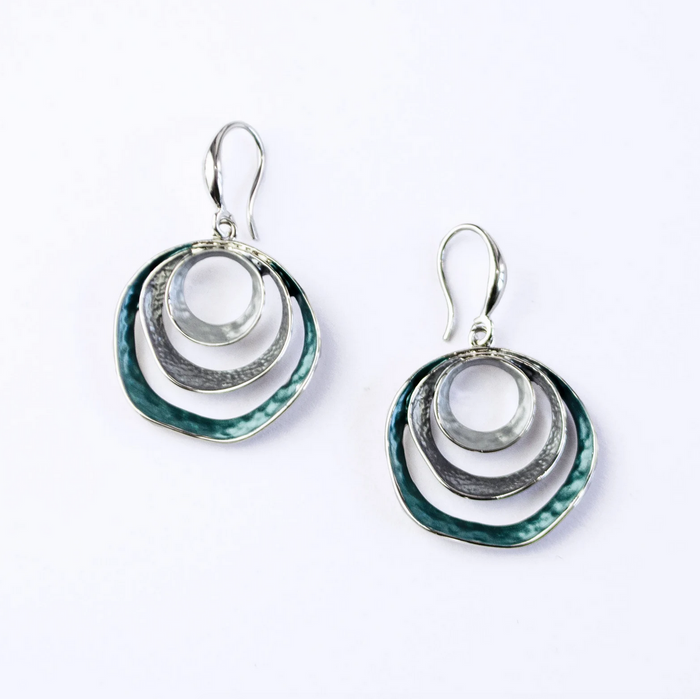 beautiful three-ring circles statement earrings with silver and blue tones on white background
