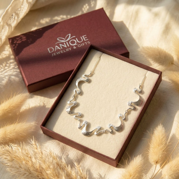 Boho wave necklace and earrings in Danique Jewelry gift box ready for gifting