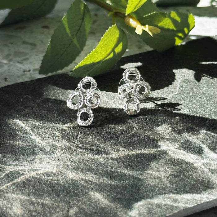 silver over zinc alloy, Connected circles earrings, stud earrings, pushback stud earrings, boho jewelry. Zinc alloy with galvanic silver finish circles bubble necklace and earrings set on stone background. Bubble necklace, boho jewelry, boho necklace, boho earrings, gold, silver, pushback earrings, push back earring, stud earrings, statement necklace set, statement set, gift for her, gift for mom, mother's day jewelry, mother's day gift, nature inspired jewelry, nature inspired necklace