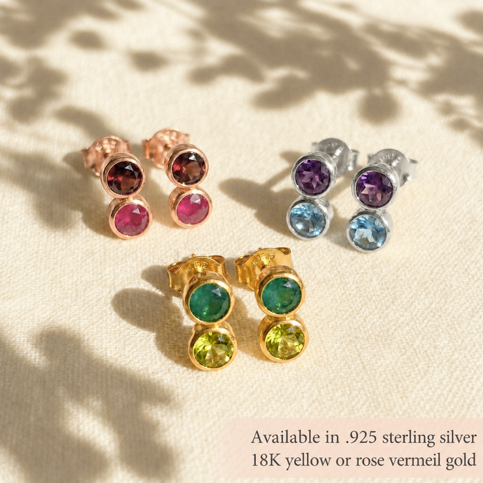 Custom birthstone stud earrings worn with colorful gemstones, showing a dainty everyday earring style that can be personalized with one, two, or three birthstones.