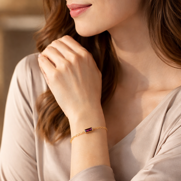 Minimalist custom birthstone bracelet worn on wrist, personalized engraved gemstone bar bracelet in gold filled chain, dainty everyday jewelry for women, meaningful gift for mom, wife, girlfriend or daughter featuring one child’s birthstone.