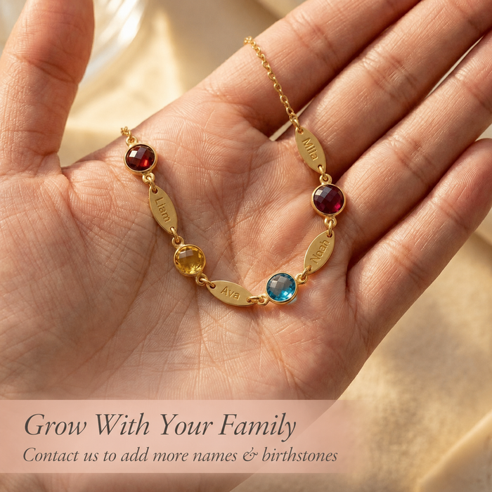 Personalized name and birthstone necklace held in hand, custom mom necklace that can grow with your family.