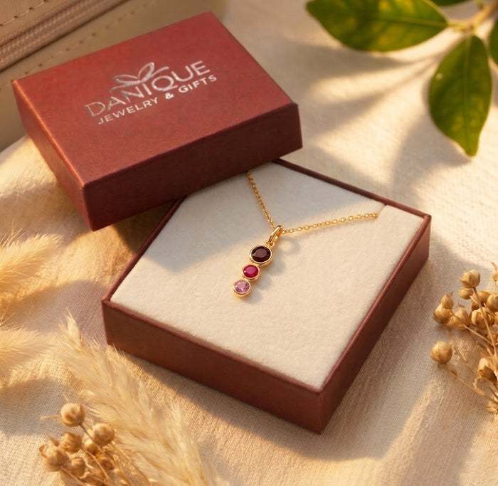 Gift-ready custom birthstone necklace displayed in a Danique Jewelry box, perfect for birthdays, new moms, grandmas, wives, and personalized family gifts.