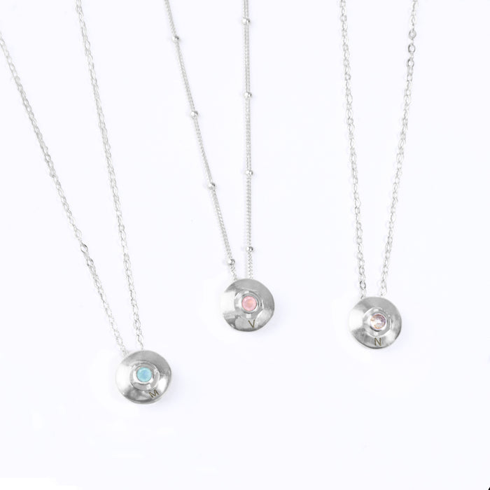 Three Necklaces with Bezel Set Round Pendants Engraved with Initials. All Parts are 925 Sterling Silver. From Left to Right: Aqua Chalcedony Pendant and cable chain, Pink Chalcedony Pendant and Satellite Chain, Opalite Pendant and cable chain
