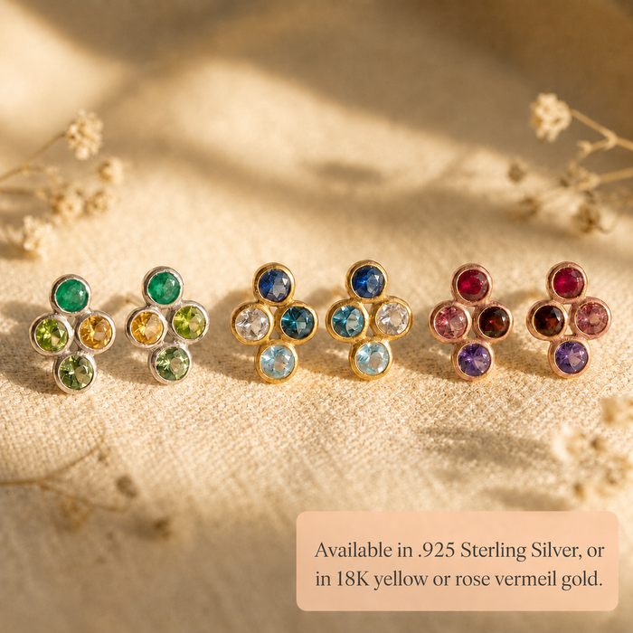 Four birthstone stud earrings shown in sterling silver, yellow gold and rose gold vermeil with custom gemstones