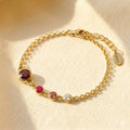 Personalized birthstone bracelet for mom with children’s birthstones and engraved initial charms, meaningful Mother’s Day jewelry gift representing family love