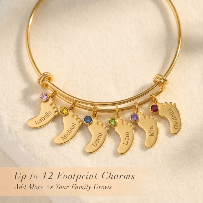 Gold footprint charm bangle bracelet with engraved children’s names and colorful tiny birthstones, customizable for up to 12 charms.
