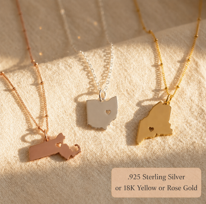 Custom state and county necklaces in three metal finishes with heart cutout