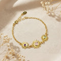 Custom sunburst birthstone bracelet for mom featuring one larger faceted gemstone for the mother and smaller birthstones for children. Personalized family bracelet crafted in sterling silver, 18k gold vermeil, or rose gold, designed as a meaningful mother’s gift.