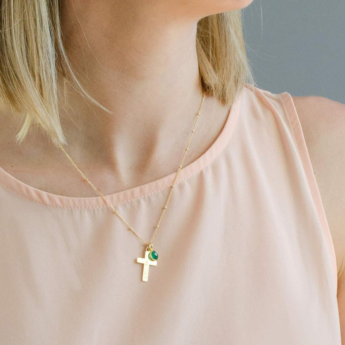 Model wearing gold cross necklace on satellite chain. Birthstone jewelry, first communion gift, easter gift, religious jewelry, cross jewelry, cross necklace, baptism gift, communion gift, gift or her, religious necklace, engraved cross charm, gift for mom, gift for teen, gift for girl, christmas gift, valentine's gift, birthday gift, anniversary gift.