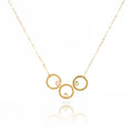 Single gold filled open circle necklace with 3 circles and stones including pink chalcedony, moonstone and aqua chalcedony.