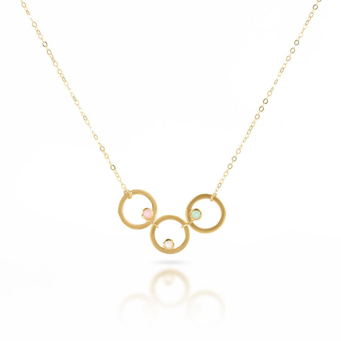 Single gold filled open circle necklace with 3 circles and stones including pink chalcedony, moonstone and aqua chalcedony.