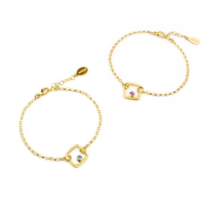 Two gold filled geometric square adjustable bracelets with kyanite and purple amethyst birthstones on a white background.