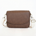 Brown leather crossbody bag on a white background