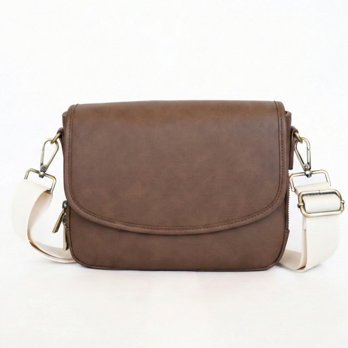 Brown leather crossbody bag on a white background