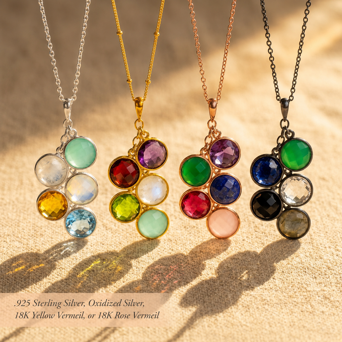 Family birthstone cluster necklace shown in yellow gold, rose gold, sterling silver, and oxidized silver finishes