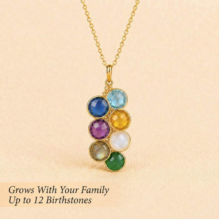 Custom birthstone necklace with up to twelve gemstones shown as a family necklace for mom or grandma