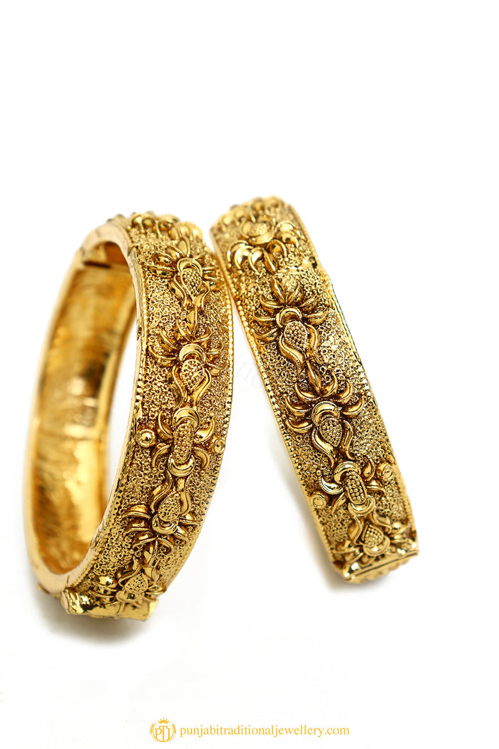 Gold Finished Bangles by PTJ