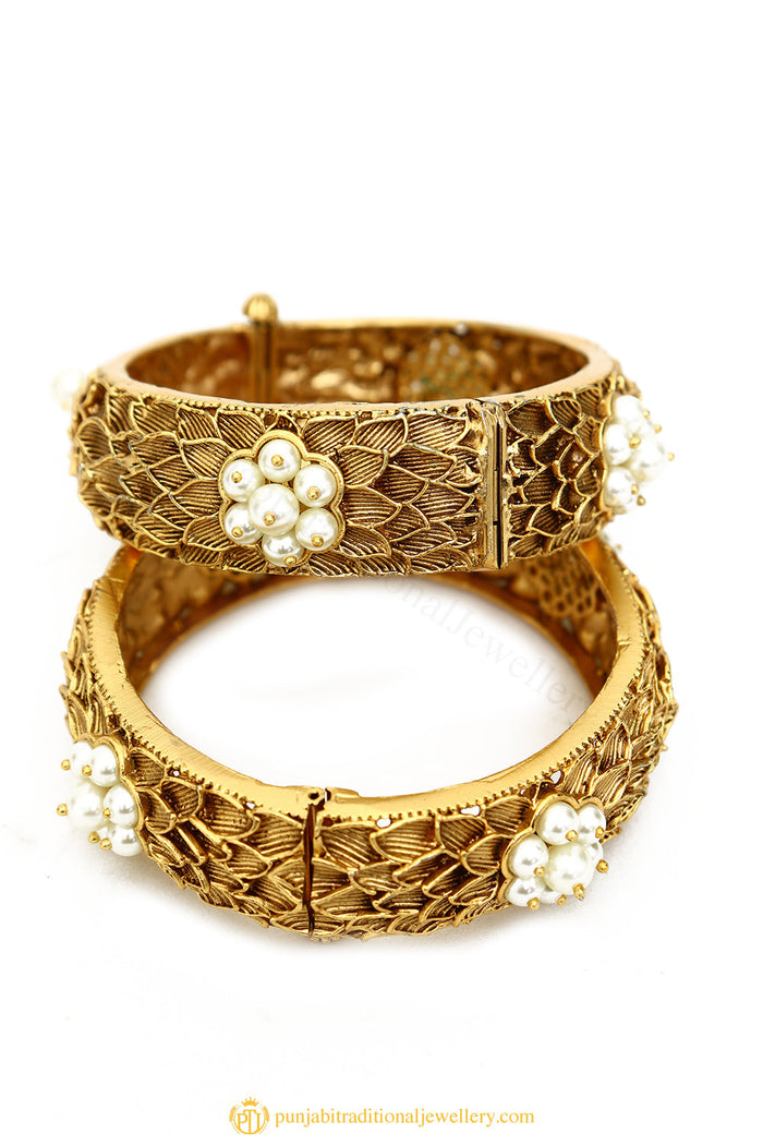 Gold Finished Bangles by PTJ