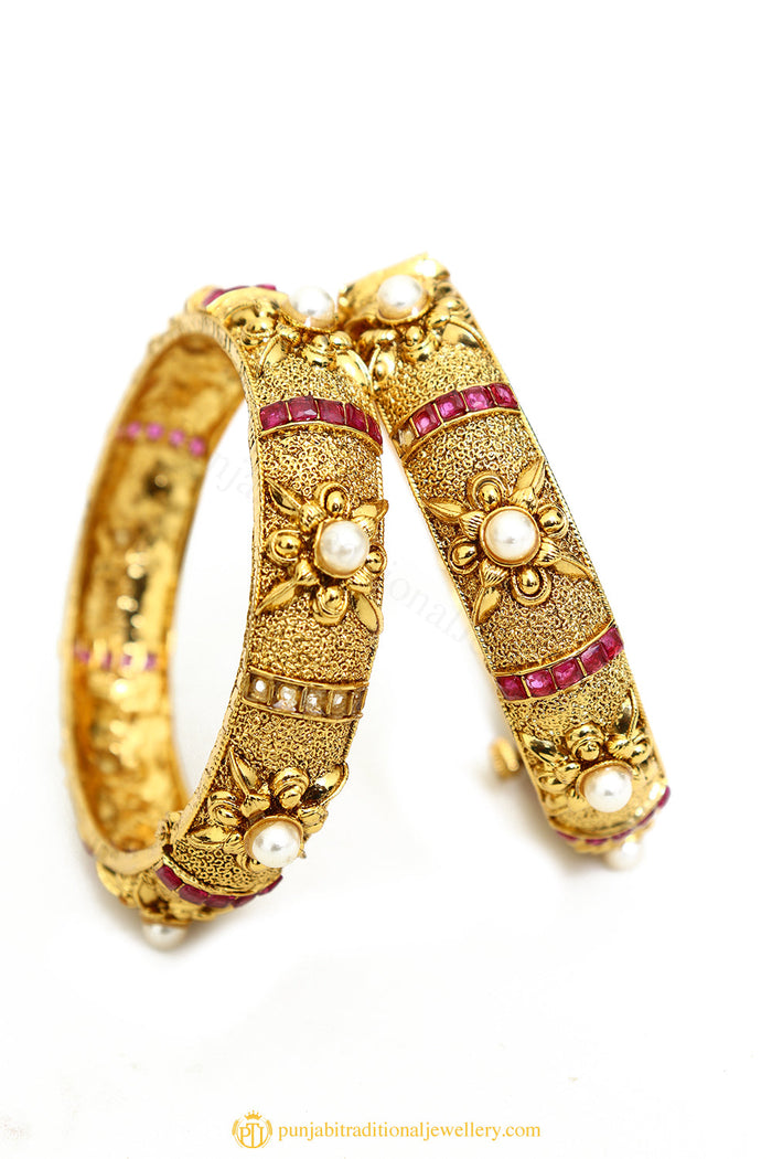 Gold Finished Bangles by PTJ