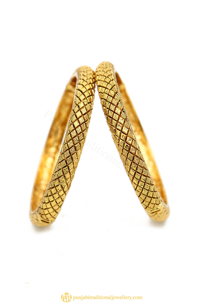 Gold Finished Bangles by PTJ