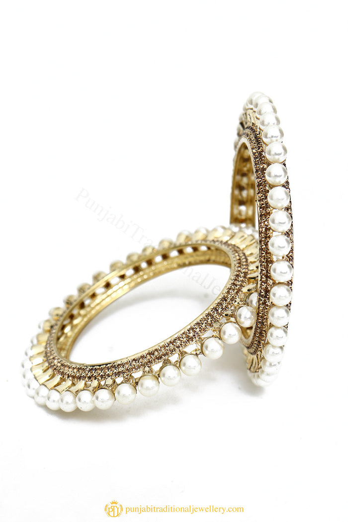 Gold Finished Bangles by PTJ