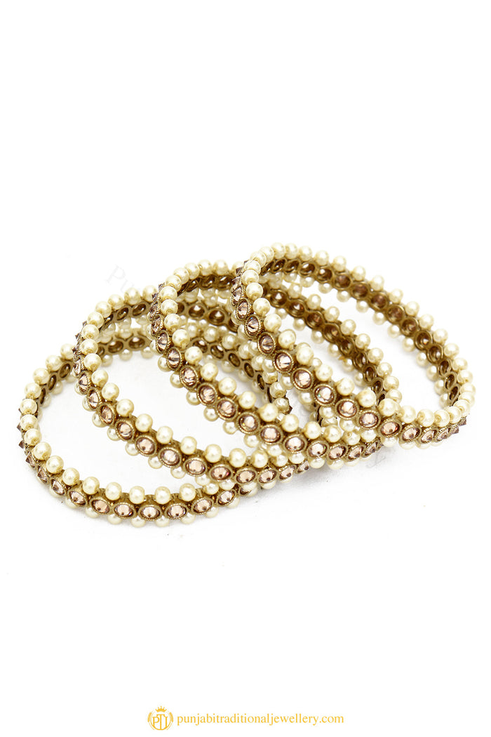 Gold Finished Bangles by PTJ