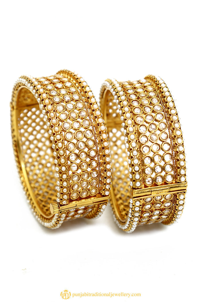 Gold Finished Bangles by PTJ