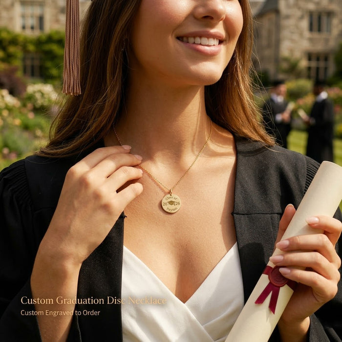 Model wearing a custom engraved graduation necklace in gold, styled as a meaningful Class of 2026 gift for her.