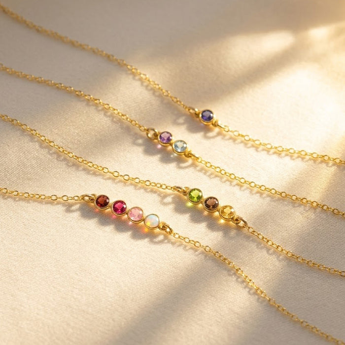 Minimalist bar mom necklace with faceted birthstones in gold, featuring a dainty horizontal gemstone bar representing children or family members, perfect personalized jewelry for Mother’s Day or everyday layering