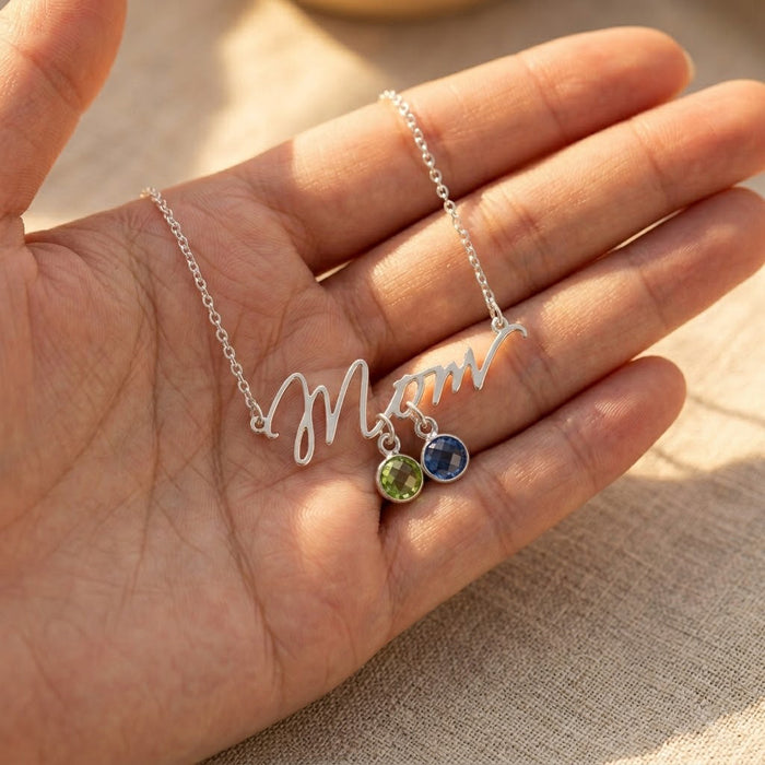 Metal option image showing Mom necklaces in sterling silver, yellow gold, and rose gold with round birthstone charms.