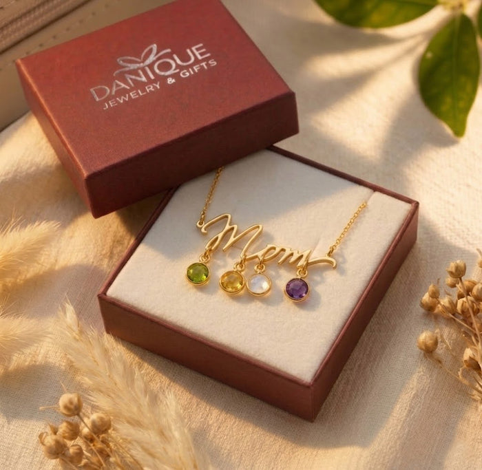 Danique Jewelry gift box with personalized Mom necklace and birthstone charms, ready for gifting.