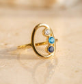 Gold mom birthstone ring with three gemstones representing children