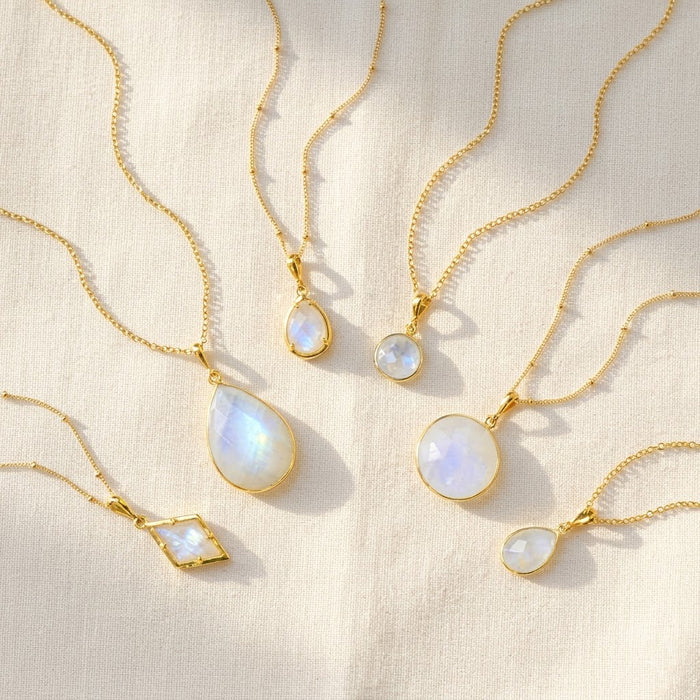 Moonstone necklaces in gold with teardrop, oval, round and geometric pendants, elegant June birthstone jewelry collection for women
