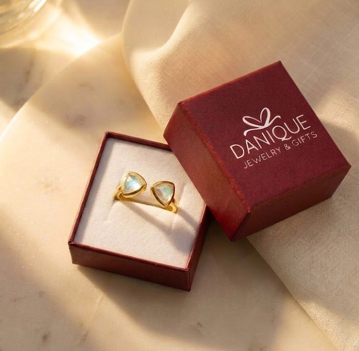 Moonstone triangle ring displayed in Danique Jewelry gift box for a ready-to-gift presentation.
