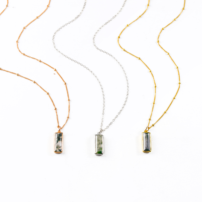 Single rose gold filled satellite chain with vertical moss agate adira bar necklace; Single sterling silver cable chain with vertical moss agate adira bar necklace, Single gold filled satellite chain with vertical moss agate adira bar necklace on white background