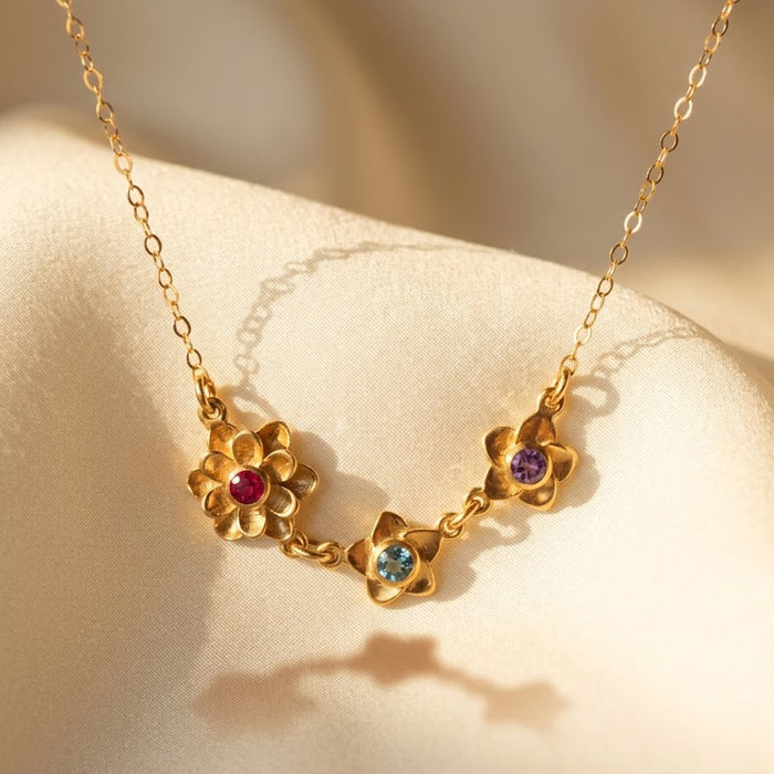 mother birthstone flower necklace with multiple small gemstone charms gold