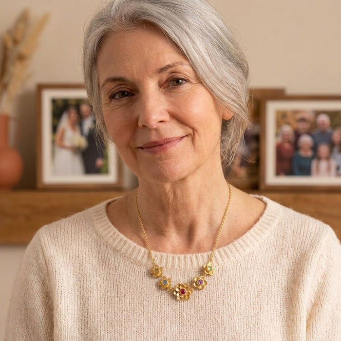 grandmother wearing custom family birthstone necklace close up