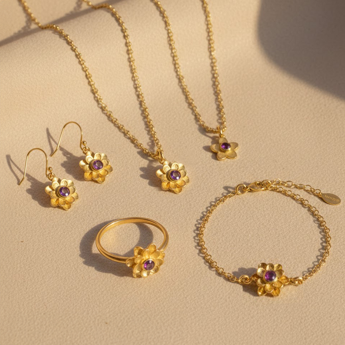 Matching jewelry set with custom birthstone flower bracelet, necklace, earrings and ring in gold
