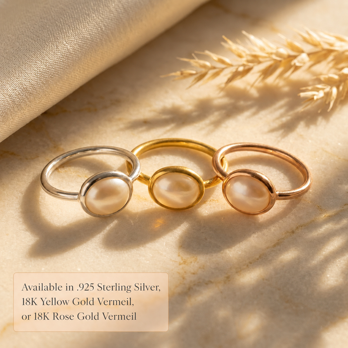 Sterling silver, yellow gold vermeil, and rose gold vermeil oval cabochon rings displayed together with metal options text.
