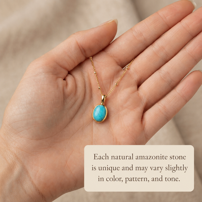 Natural amazonite necklace in Danique Jewelry gift box with warm sunlight and botanical styling.