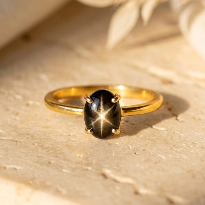 Natural oval Black Star Sapphire prong-set ring in 18K yellow gold vermeil