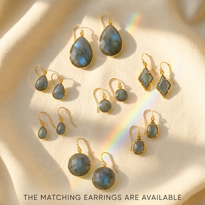 Matching labradorite earrings in round, teardrop, prong-set, and geometric shapes.