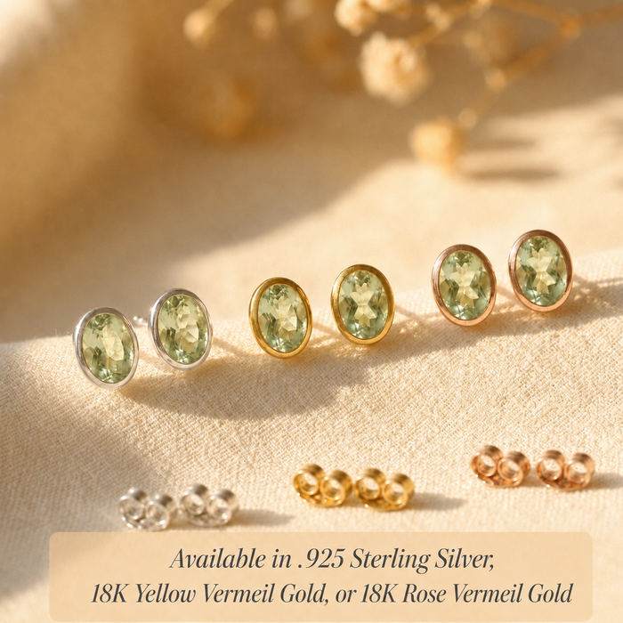 Oval birthstone stud earrings shown in sterling silver, yellow vermeil gold, and rose vermeil gold with 8x12mm gemstones.