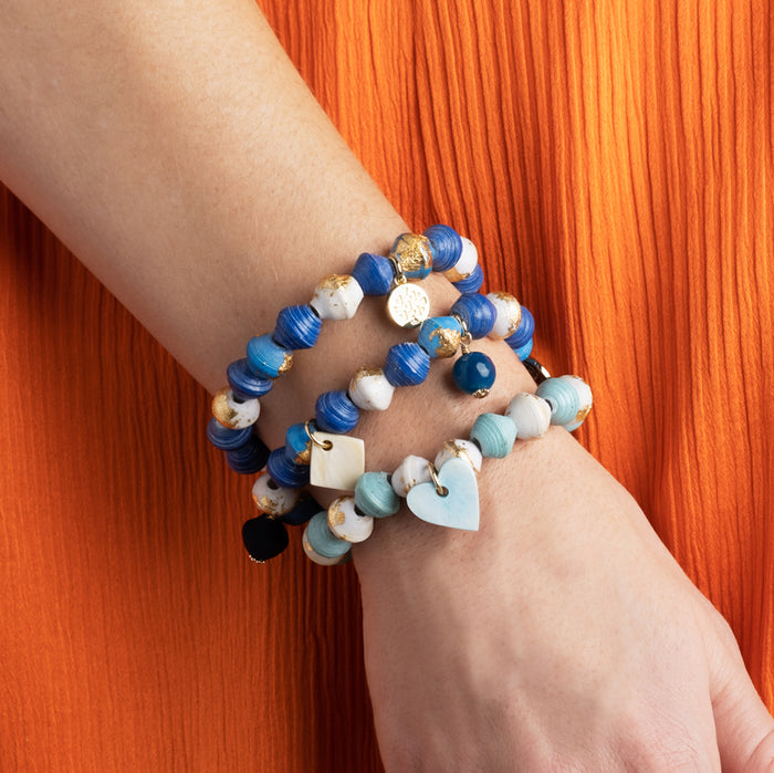 Paper beads stretch bracelet in blue tones