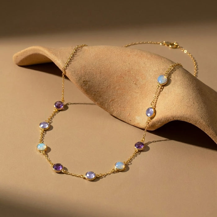 Taylor Swift-inspired birthstone necklace gold plated with 9 birthstones. music lover jewelry, music lover gift, valentines day, birthstone jewelry, birth month jewelry, February Purple Amethyst, Alexindrite, Opalite birthstones, custom layering necklace