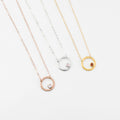 Rose gold filled circle moonstone birthstone necklace, Sterling silver open circle geometric necklace with pink chalcedony birthstone and a gold filled open circle necklace with garnet birthstone.